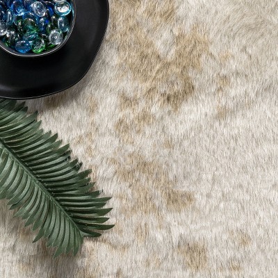 EcoChic Off-White Faux Cowhide 5' x 7' Easy-Care Area Rug