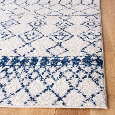 Ivory and Navy Moroccan Geometric 6' x 9' Area Rug