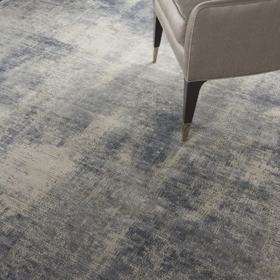 Modern Abstract Blue & Ivory Synthetic 9'3" x 12'9" Area Rug