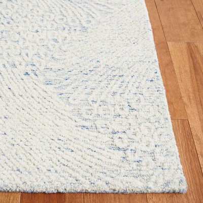 Handmade Blue Wool 5' x 8' Tufted Area Rug