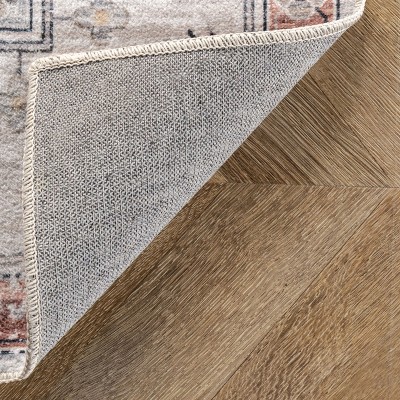 4' x 6' Orange and White Medallion Washable Synthetic Rug