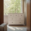 This storage cabinet measures 44.88 inches in size, comes with seven drawers, and is off-white in color. - 2 of 4