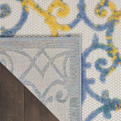 Ivory Blue Floral Synthetic Rectangular Indoor/Outdoor Rug 7' x 10'
