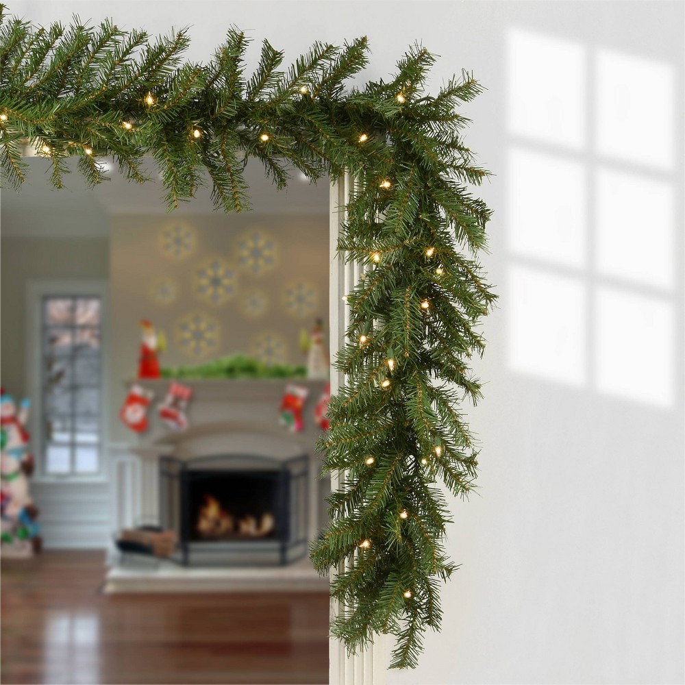 National Tree Company 9' Prelit Norwood Fir Artificial Garland with 50 Clear Lights 225 Tips