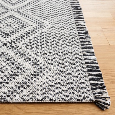 Ivory and Black Geometric Cotton Synthetic Rectangular Area Rug