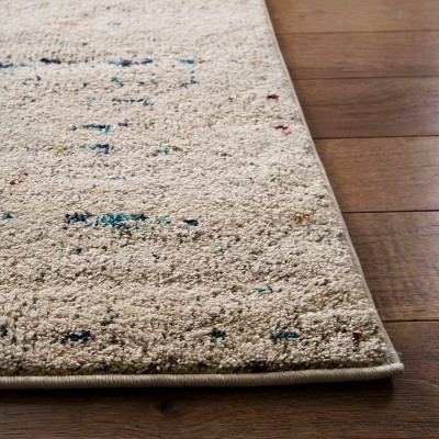 Ivory and Blue Reversible Synthetic 8' x 10' Rug