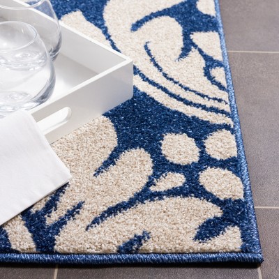 Ivory Floral Elegance 4' x 6' Reversible Synthetic Area Rug