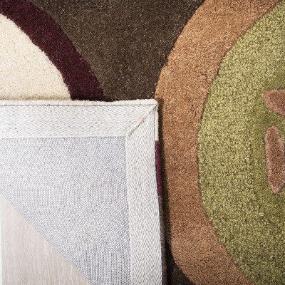 Handmade Round Ivory Wool and Viscose Tufted Rug