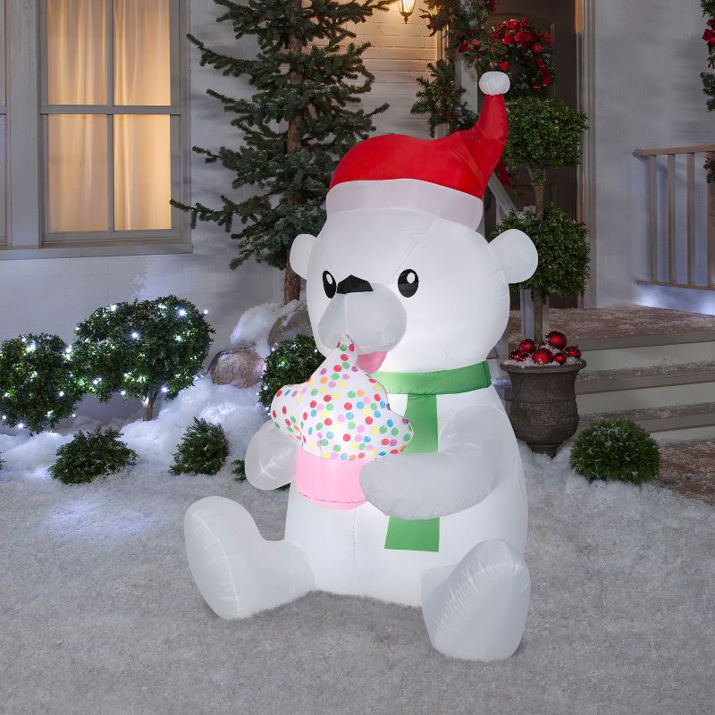 Gemmy Animated Christmas Airblown Inflatable Nom Polar Bear w/Cupcake, 5.5 ft Tall, Multicolored, 2 of 3