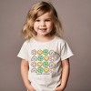 The Juniper Shop SmileyWorld Smiley Clover Daisy Toddler Short Sleeve Tee - 3 of 4
