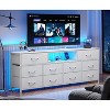 Furnulem 63” long bedroom dressing table suitable for 65 to 75 inch TV dressing table with 10 fabric drawers includes power outlet and LED lighting - 2 of 4