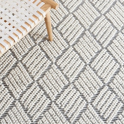 Handmade Black and Ivory Geometric Wool Rug, 2' 3" x 8'