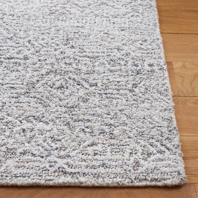 Gray Hand Tufted Wool and Synthetic 6' x 9' Area Rug