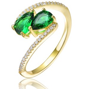 Guili Elegant Sterling Silver 14K Gold-Plated Bypass Ring with Emerald Cubic Zirconia for a Chic, Timeless Sparkle. Green or Blue, Sizes 6-8. - 1 of 3