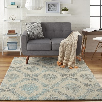 Elegant Ivory and Turquoise Floral Synthetic 6' x 9' Area Rug