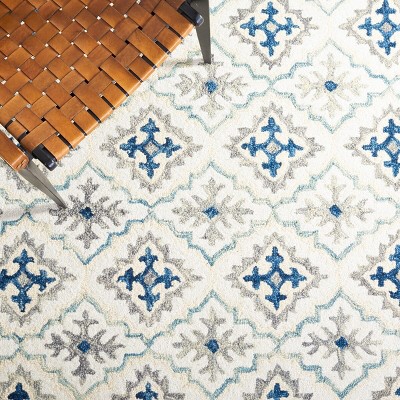 Handmade Ivory Wool-Cotton Blend Tufted Rectangular Rug 8' x 10'