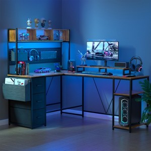 Huxxion 67" L Shaped Gaming Desk, Reversible Computer Desk with Power Outlet Monitor Stands & Pegboard - 1 of 4