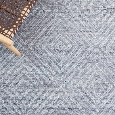 Handmade Blue Abstract Tufted Wool Rectangular Rug 27" x 4"