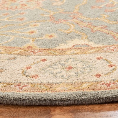 Antiquity Blue and Ivory Oval Wool Area Rug
