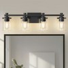 DORESshop 28 in. 4 Light Matte Black Industrial Modern Cylinder Vanity Light for Bathroom with Clear Glass Shades - 3 of 4