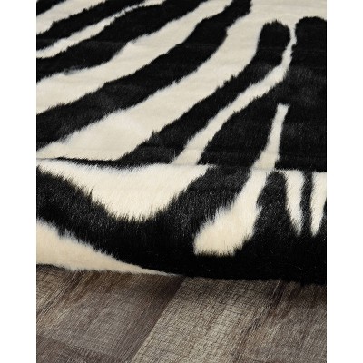 Black Spot Tufted Faux Cowhide 5'x6'6" Rug