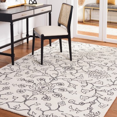 Ivory and Black Floral Hand-Tufted Wool Area Rug 4' x 6'