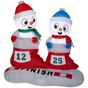Gemmy Christmas Airblown Inflatable Snowman in Stocking Races Scene, 4 ft Tall, Multicolored - 1 of 2