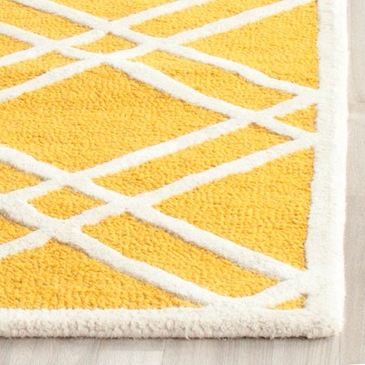 Gold and Ivory Hand-Tufted Wool Area Rug 3' x 5'