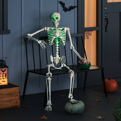 60" Light and Sound Poseable Lifesize Skeleton Halloween Decorative Prop Off-White - Hyde and EEK! Boutique™