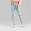 Women's Super-High Rise Distressed Skinny Jeans - Wild Fable™ Light Wash - image 2 of 3