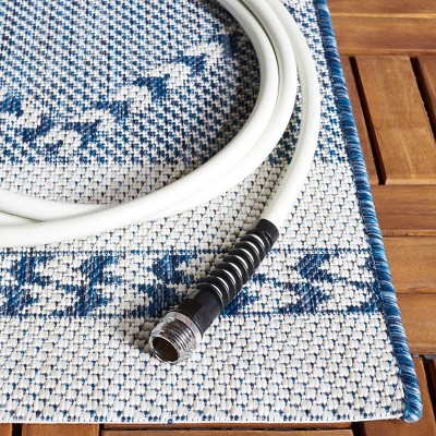 Navy and Ivory Rectangular Synthetic Area Rug
