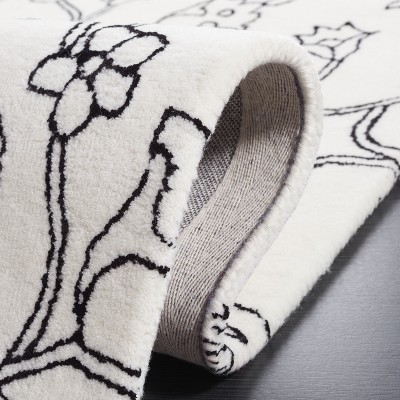 Ivory and Black Floral Tufted Handmade Wool Rug