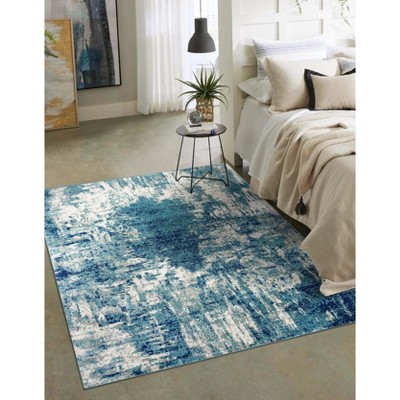 Light Blue Abstract 8' x 10' Stain-Resistant Synthetic Rug