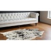 HomeRoots 5' X 7' Black and White Cowhide Hand Knotted Area Rug - 2 of 4
