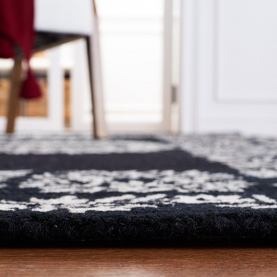 Empire Black and Ivory Hand-Tufted Wool Area Rug