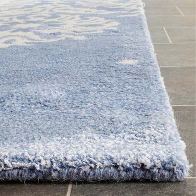 Ivory and Light Blue Hand-Tufted Wool Area Rug 4' x 6'