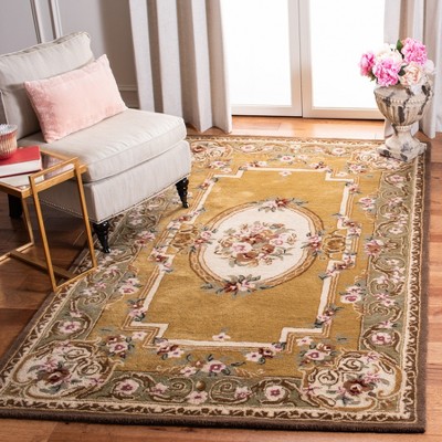 Ivory and Gold Hand-Tufted Wool Oval Area Rug