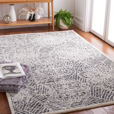 Black and Ivory Hand-Tufted Wool Floral Area Rug