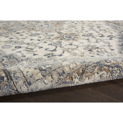 Ivory and Grey Synthetic 5' x 7' Reversible Area Rug