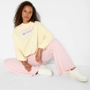 Women's Wicked Butterfly Pearl Graphic Sweatshirt - Cream - 1 of 3