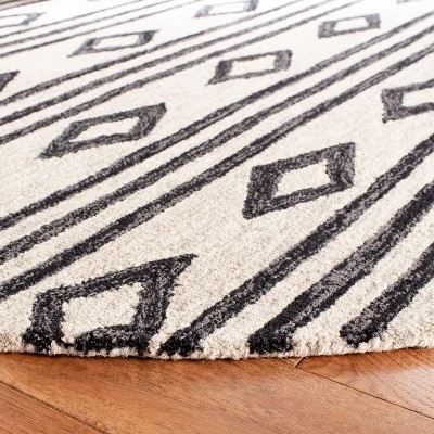 Ivory and Charcoal Handmade Wool Area Rug