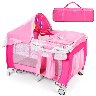 Image of Costway Foldable Baby Crib Playpen Travel Infant Flat Bassinet Bed Mosquito Net Music with Bag Pink