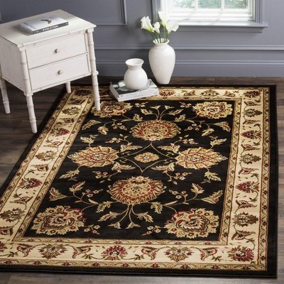 Black and Ivory Floral Synthetic 5' x 7' Area Rug