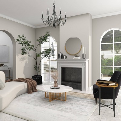Black Round Metal and Stone Accent Table with Graduated Legs