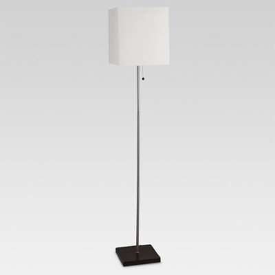 white and silver floor lamp