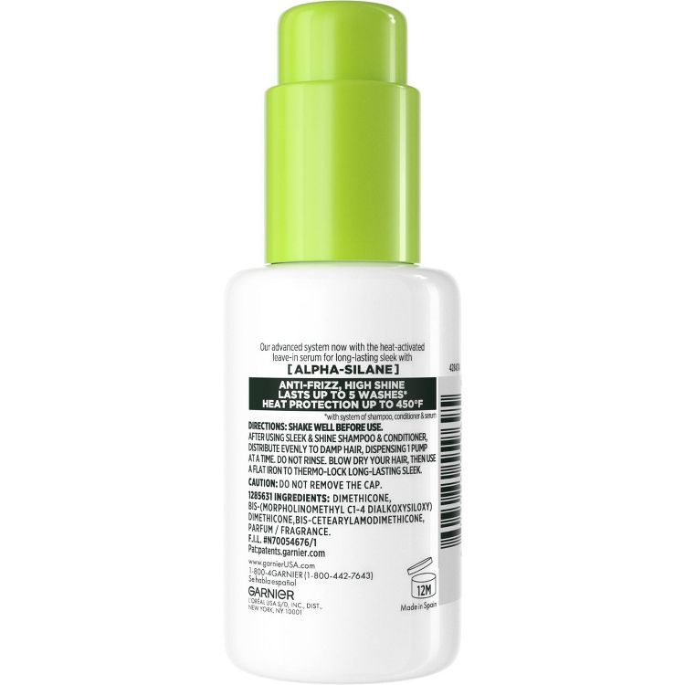 White bottle with a green cap labeled "[ALPHA+SILANE] Anti-Frizz, High Shine, Lasts Up to 5 Washes, Heat Protection Up to 450°F" and directions for use.
