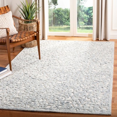 Ivory Hand-Tufted Wool 4' x 6' Area Rug