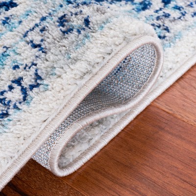 Ivory and Blue Hand-Knotted Round Synthetic Area Rug