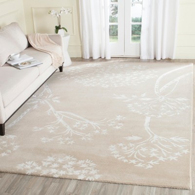 Sand and Ivory Floral Hand-Tufted Wool 6' x 9' Area Rug