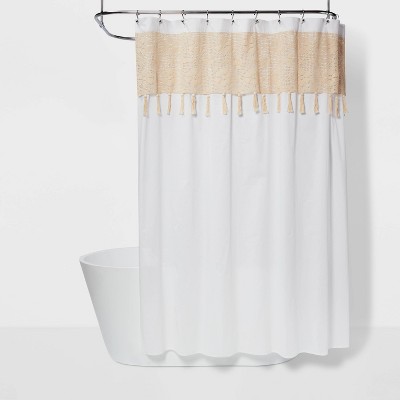 white and beige shower curtain